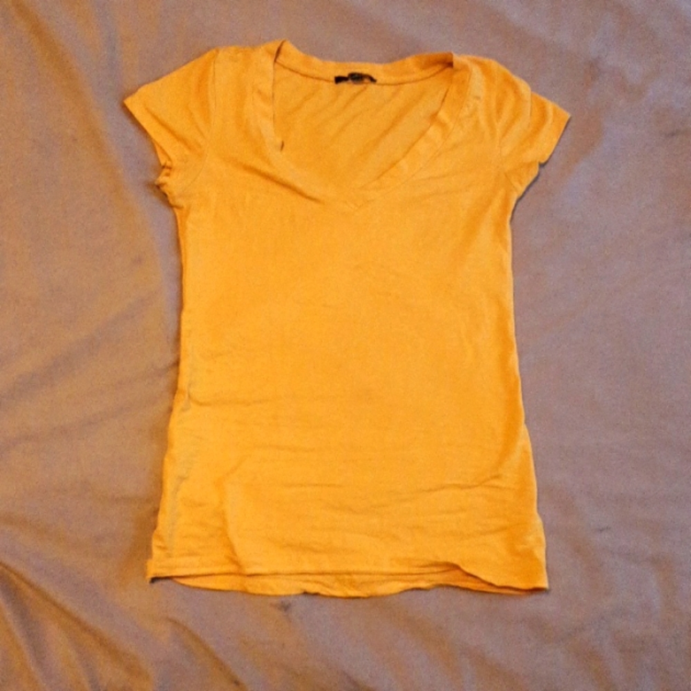 Orange tshirt good condition ambiance size small